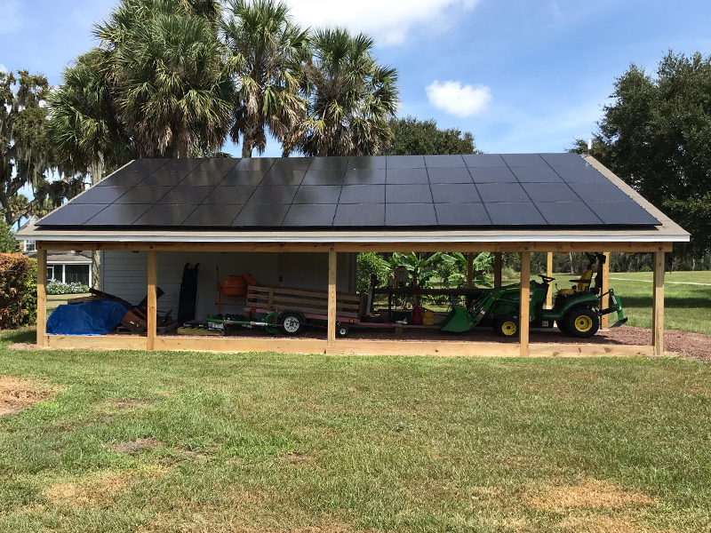 garage covered with solar panels to power their machines